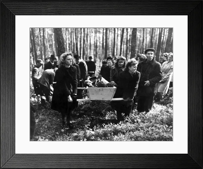 Framed Print : German women carry a corpse from in the woods near Neunburg, Germany