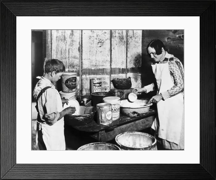 Framed Print : Tenant farming family's Mother and son wash dishes, Mississippi, ca. 1931. They have received Red Cross food during the drought Framed Print : Tenant farming family's Mother and son wash dishes, Mississippi, ca. 1931. They have received Red Cross food during the drought