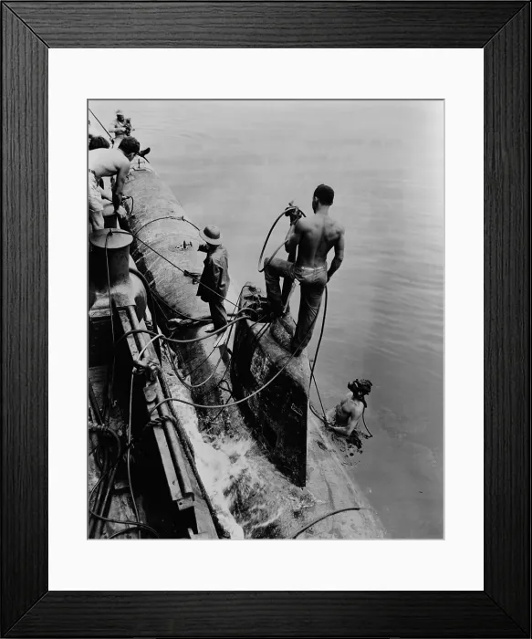 Framed Print : U.S. Navy tug raises one of eight Japanese midget subs from Pearl Harbor, July 17, 1943