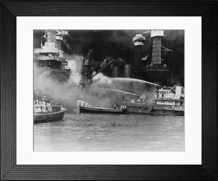 Framed Print : U.S. sailors in fireboats at the side of the burning battleship, USS West Virginia. The ship was struck by at least 7 torpedoes during the Japanese attack on Pearl Harbor, Dec