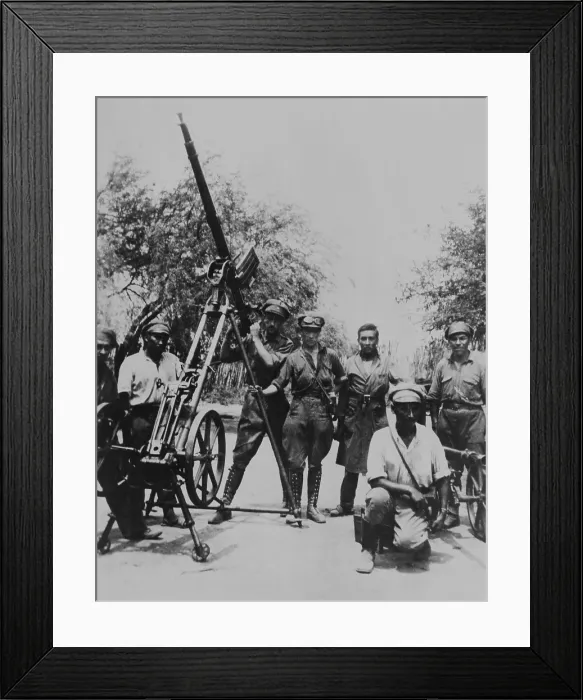 Framed Print : Bolivians train anti-air gun on Paraguayan airplane on May 24, 1934. The Chaco War was fought over the Chaco Boreal wilderness region and lasted from 1932-35. (BSLOC_2013_9_108)