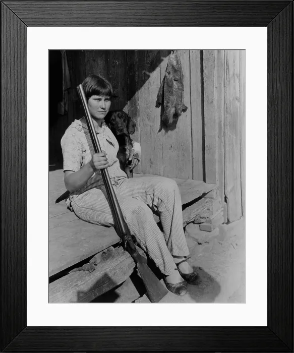 Framed Print : Ozark farmer's daughter holding double barrel shotgun, ca. 1930. Near Damascus, Arkansas, photo by Lewis Hine. (BSLOC_2013_8_90)