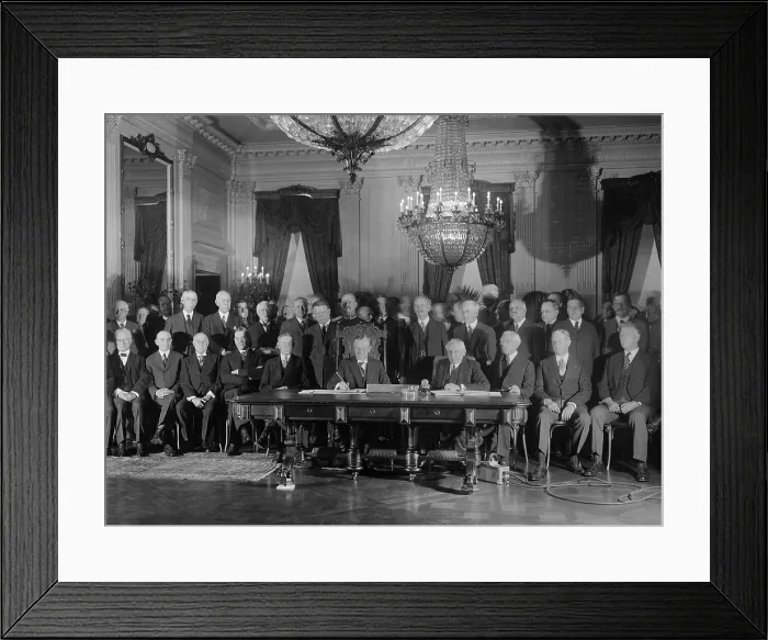 Framed Print : President Coolidge signs Kellogg Treaty in the East Room of the White House on Jan. 17, 1929. Kellogg-Briand Pact was an multi-national agreement to outlaw war Framed Print : President Coolidge signs Kellogg Treaty in the East Room of the White House on Jan. 17, 1929. Kellogg-Briand Pact was an multi-national agreement to outlaw war