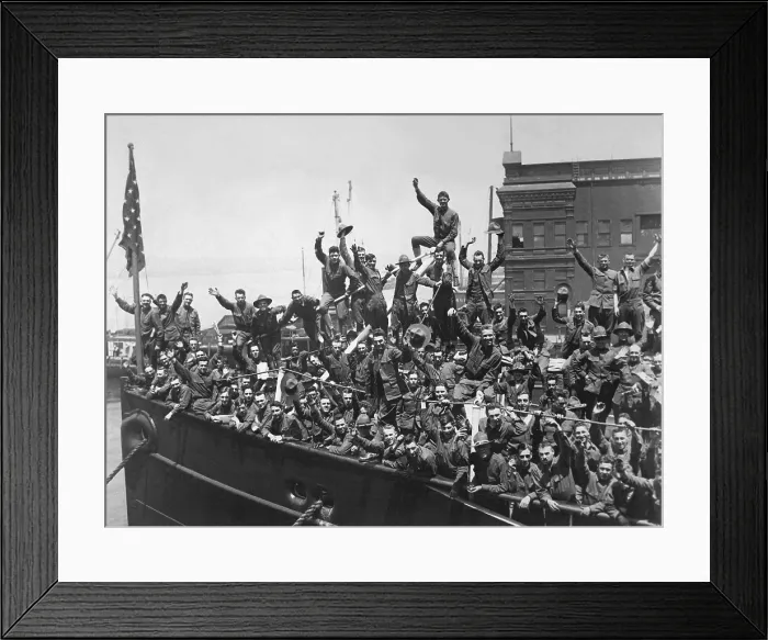 Framed Print : U.S. Soldiers wave from a troop ship embarked for France. World War I. 1917