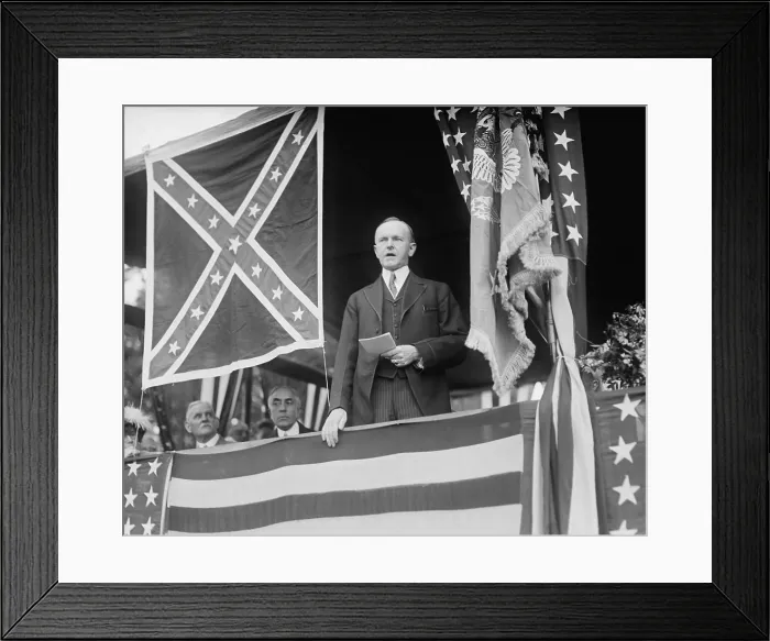 Framed Print : President Calvin Coolidge speaking beside Confederate flag at Arlington Cemetery. May 24, 1924. (BSLOC_2015_15_126)