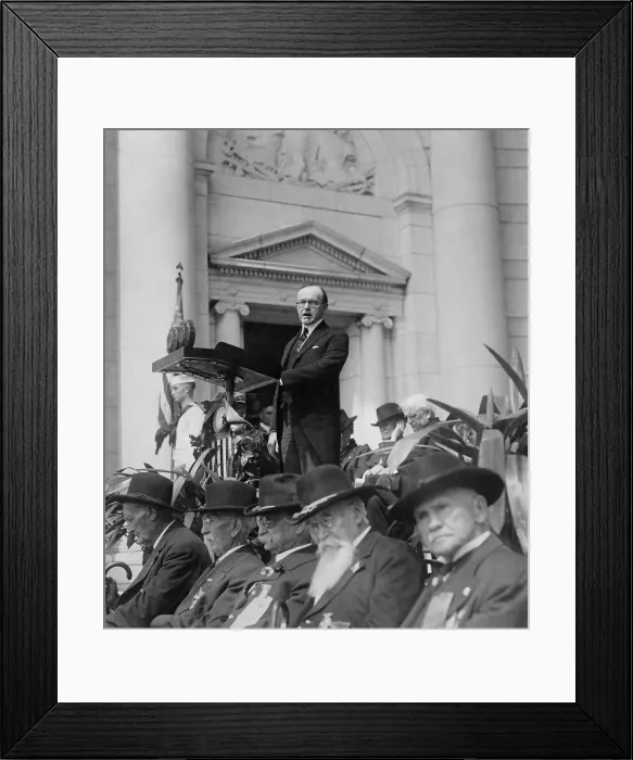 Framed Print : President Calvin Coolidge speaking at Arlington Amphitheater. In the foreground are aged veterans in their 19th century uniforms. May 24, 1924. (BSLOC_2015_15_127)