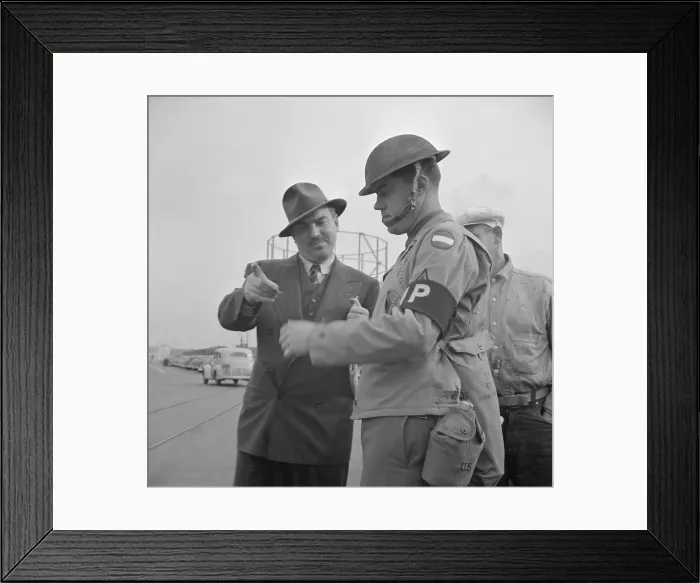 Framed Print : Day after Pearl Harbor attack in San Francisco. Military police checks IDs at transport dock. Dec. 8, 1941. (BSLOC_2013_11_155)
