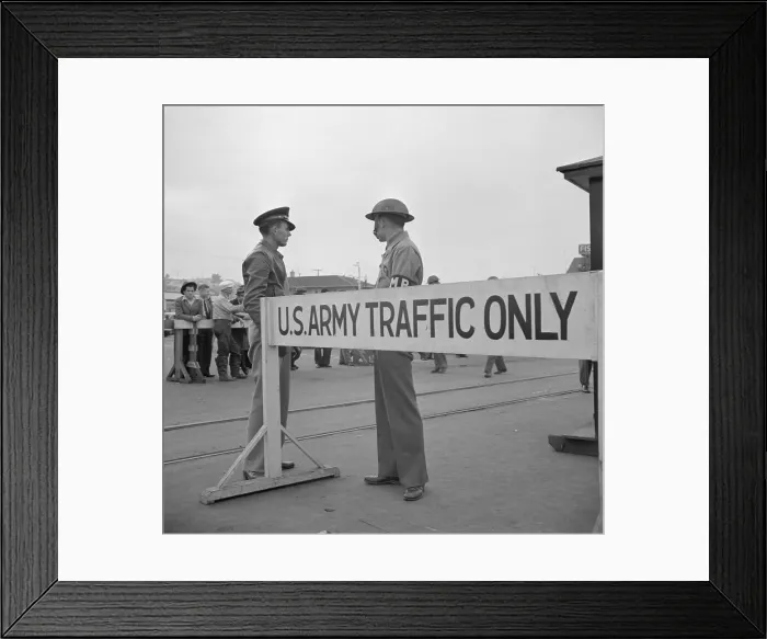 Framed Print : Day after Pearl Harbor attack in San Francisco. Army sentries standing guard at transport dock. Dec. 8, 1941. (BSLOC_2013_11_154)