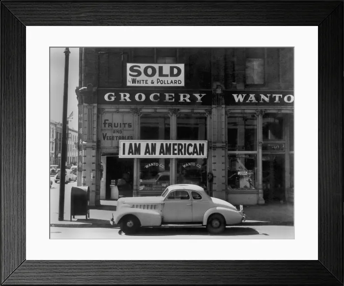Framed Print : I AM AN AMERICAN sign on a store front. The owner, a University of California graduate of Japanese descent, put the sign up the day after Pearl Harbor