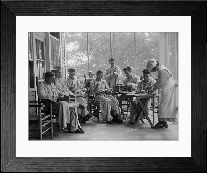 Framed Print : American World War 1 veterans in rehabilitation doing needlework. 1917-19. Boredom during long stays in military hospitals was relieved by such activities. (BSLOC_2012_4_68) Framed Print : American World War 1 veterans in rehabilitation doing needlework. 1917-19. Boredom during long stays in military hospitals was relieved by such activities. (BSLOC_2012_4_68)
