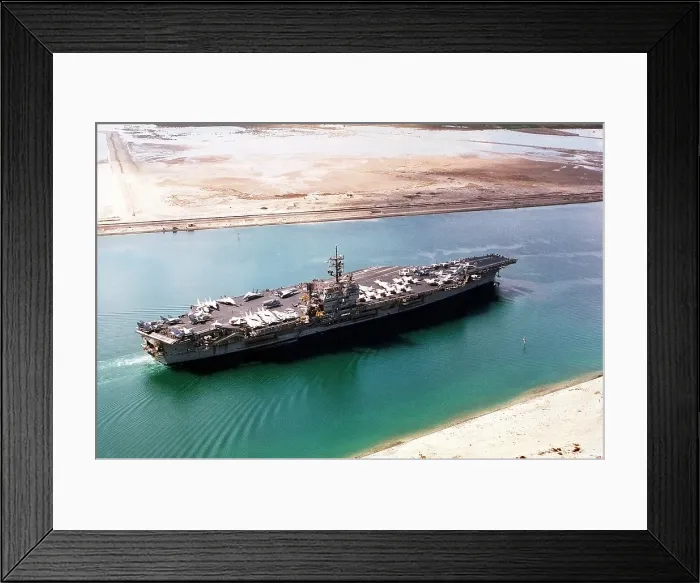 Framed Print : Aircraft carrier JOHN F. KENNEDY in the Suez Canal traveling home to Norfolk Virginia after a seven month deployment during the First Iraq War. 1991. Mar. 1 1991 Framed Print : Aircraft carrier JOHN F. KENNEDY in the Suez Canal traveling home to Norfolk Virginia after a seven month deployment during the First Iraq War. 1991. Mar. 1 1991