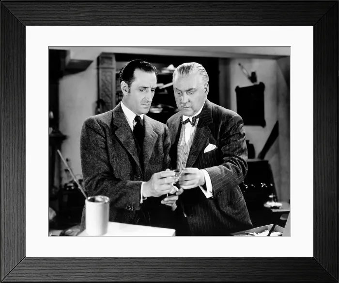 Framed Print : THE PEARL OF DEATH, from left, Basil Rathbone, Nigel Bruce, 1944