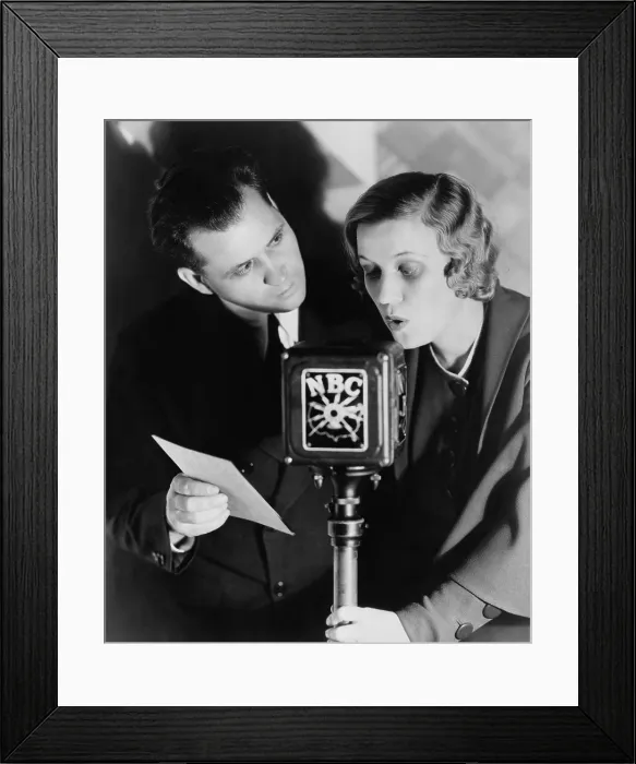 Framed Print : Fibber McGee & Molly radio show stars Jim and Marian Jordan performing in 1932. (BSLOC_2013_9_12)