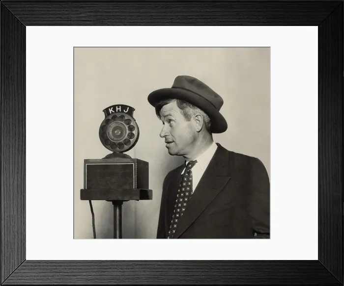 Framed Print : Will Rogers, American humorist, at a radio microphone, ca. 1930. (BSLOC_2013_9_11)