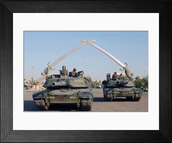 Framed Print : Soldiers in an Army Abrams Tank pose for a photo under the Hands of Victory in Ceremony Square Baghdad Iraq