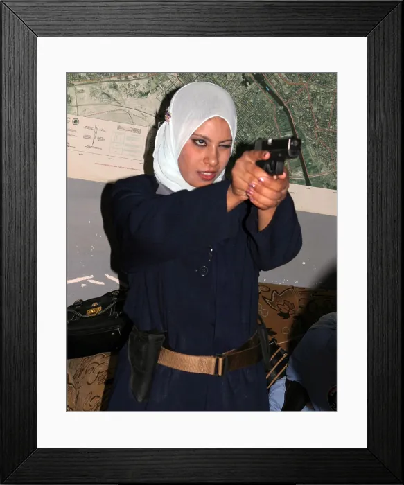 Framed Print : Female Iraqi police officers practice shooting at the Forsan Police Station in Ramadi Iraq July 23 2007. (BSLOC_2011_12_142) Framed Print : Female Iraqi police officers practice shooting at the Forsan Police Station in Ramadi Iraq July 23 2007. (BSLOC_2011_12_142)