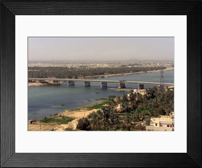 Framed Print : The main bridge in An Nasiriyah Iraq where intense fighting occurred between US Marines and Iraqi soldiers from March 23-April 1 2003 during the Second Gulf War Framed Print : The main bridge in An Nasiriyah Iraq where intense fighting occurred between US Marines and Iraqi soldiers from March 23-April 1 2003 during the Second Gulf War