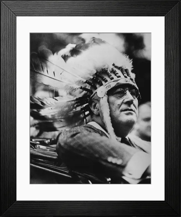 Framed Print : President Franklin Roosevelt wears a Native American war bonnet. Aug. 23, 1933. He was inducted into the National Scout Order of the Arrow at the Ten Mile River Camp, N.Y Framed Print : President Franklin Roosevelt wears a Native American war bonnet. Aug. 23, 1933. He was inducted into the National Scout Order of the Arrow at the Ten Mile River Camp, N.Y