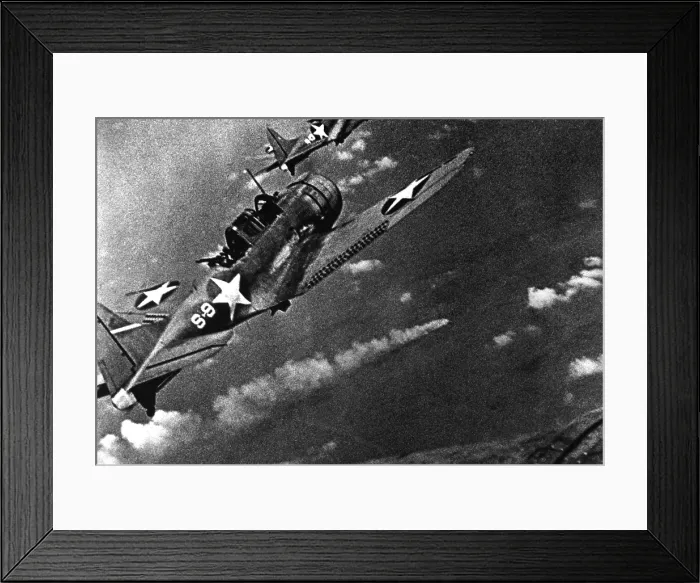 Framed Print : Battle of Midway, June 4-6, 1942. U.S. Douglas SBD-3 Dauntless dive bomber from the USS Hornet continues the attack on the burning Japanese cruiser Mikuma, June 6, 1942
