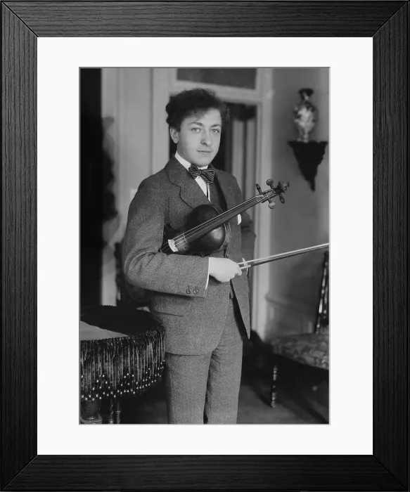 Framed Print : Jascha Heifetz, Russian born violinist who debuted at Carnegie Hall on October 27, 1917 at age 17. He became a US citizen in 1925 (BSLOC_2017_12_34)