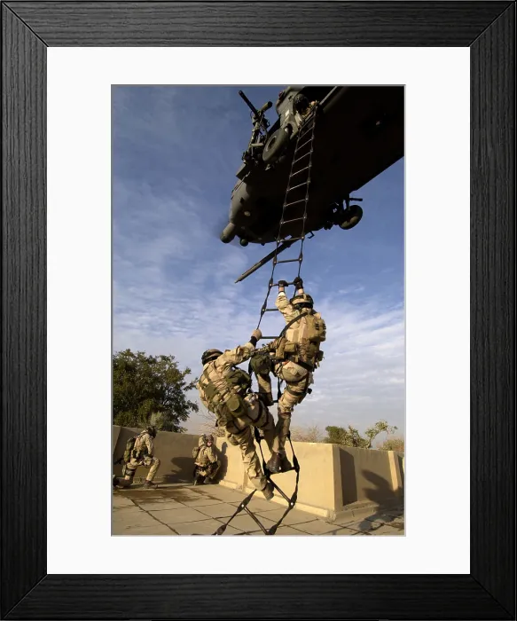 Framed Print : US Air Force Rescue Squadron climb into a helicopter near the Baghdad International Airport Iraq. on Dec. 20 2004 (BSLOC_2011_12_151)