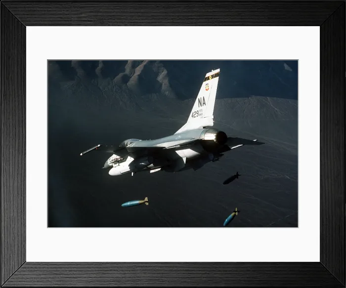 Framed Print : F-16 Fighter releasing three 2000-pound bombs. Feb 1 1987. (BSLOC_2011_12_220) Framed Print : F-16 Fighter releasing three 2000-pound bombs. Feb 1 1987. (BSLOC_2011_12_220)