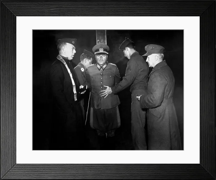 Framed Print : German Gen. Anton Dostler tied to a stake before his execution on Dec. 1, 1945. He was convicted of ordering the execution of 15 U.S. Army commandos in Italy in March 1944 Framed Print : German Gen. Anton Dostler tied to a stake before his execution on Dec. 1, 1945. He was convicted of ordering the execution of 15 U.S. Army commandos in Italy in March 1944