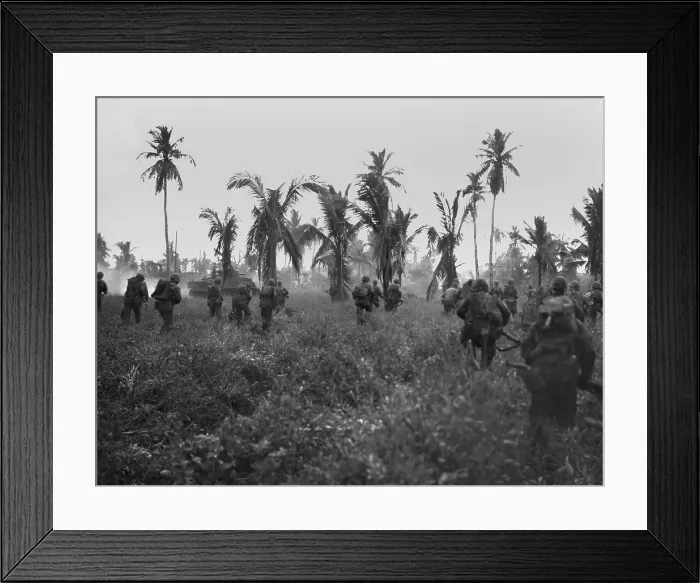 Framed Print : U.S. Marines in pursuit of retreating Japanese on Guam Island. Sherman tanks lead the assault through thick brush. July 1944, during World War 2. (BSLOC_2013_14_43) Framed Print : U.S. Marines in pursuit of retreating Japanese on Guam Island. Sherman tanks lead the assault through thick brush. July 1944, during World War 2. (BSLOC_2013_14_43)