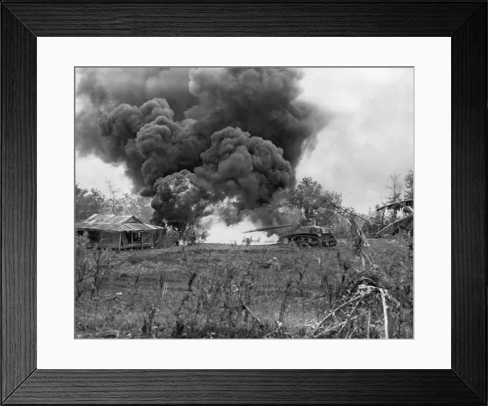 Framed Print : U.S. Marine flame-throwing tank attacks a Japanese pillbox on Saipan. In mid-ground a Marine watches from a foxhole. Battle of Saipan was fought from June 15-July 9, 1944 Framed Print : U.S. Marine flame-throwing tank attacks a Japanese pillbox on Saipan. In mid-ground a Marine watches from a foxhole. Battle of Saipan was fought from June 15-July 9, 1944