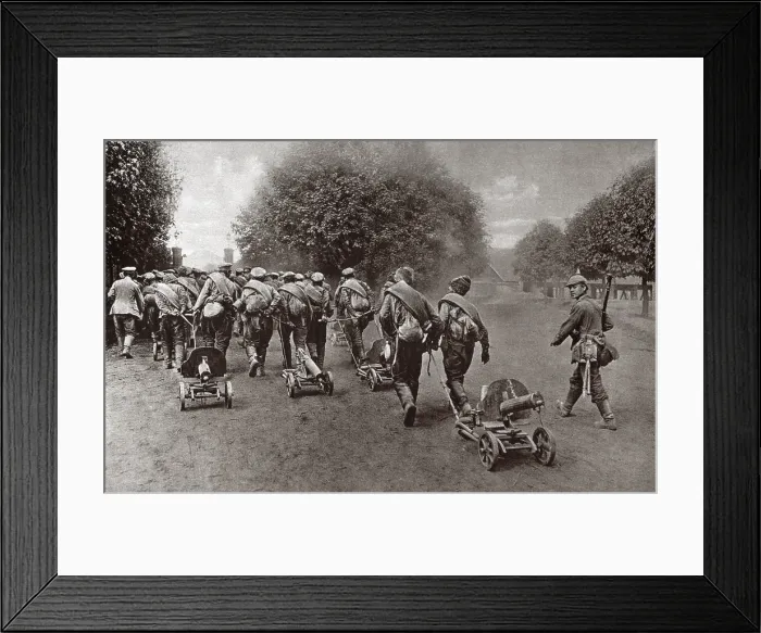 Framed Print : World War 1. Captured near Lubin, Russian prisoners pull their captured machine guns under German guard. They will be sent to a prison camp in the interior of Germany. Ca. 1914-15 Framed Print : World War 1. Captured near Lubin, Russian prisoners pull their captured machine guns under German guard. They will be sent to a prison camp in the interior of Germany. Ca. 1914-15