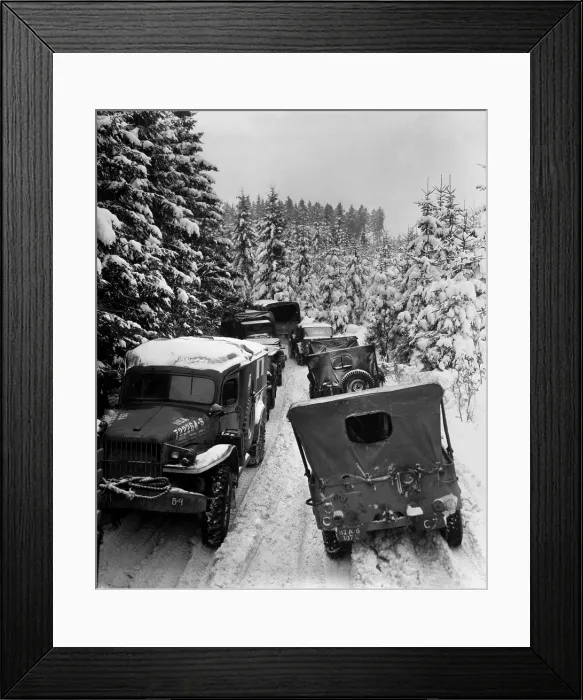 Framed Print : Deep snow banks on a narrow road halt military traffic in the woods of Wallerode, Belgium. After the Battle of the Bulge, Allied forces renewed their drive into Germany