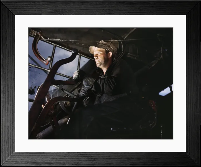 Framed Print : Crane operator at TVA's Douglas Dam, Tennessee. After U.S. entry into World War 2, construction on this dam was important to provide power for the defense industry. June 1942