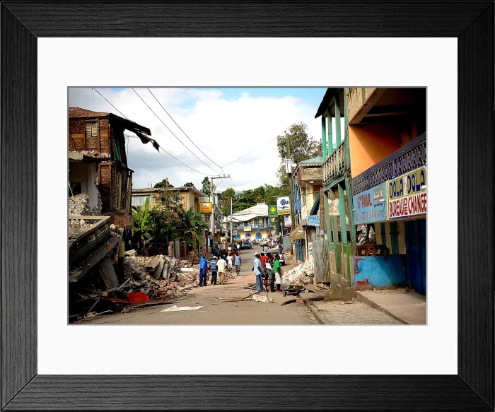 Framed Print : Buildings are destroyed in Jacmel Haiti from 7.0-magnitude earthquake. Jacmel with a population of 50 000 lost 350 people to the earthquake on January 12 2010. (BSLOC_2011_12_387)