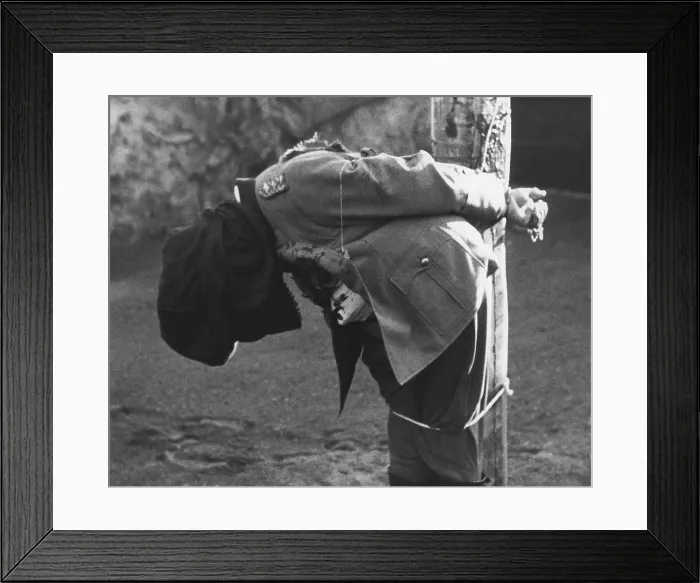 Framed Print : German General Anton Dostler's body slumps after his execution by a firing squad at Aversa, Italy. Dec Framed Print : German General Anton Dostler's body slumps after his execution by a firing squad at Aversa, Italy. Dec