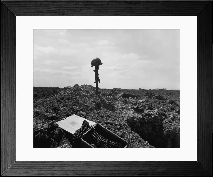 Framed Print : Helmet and rifle monument to a dead U.S. soldier on a shell-blasted beach of France. He was killed on D-Day during the Normandy landings, June 6, 1944, World War 2 Framed Print : Helmet and rifle monument to a dead U.S. soldier on a shell-blasted beach of France. He was killed on D-Day during the Normandy landings, June 6, 1944, World War 2