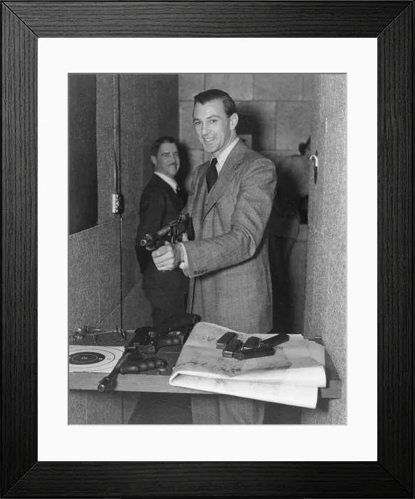 Framed Print : Gary Cooper with submachine in FBI Gun Range. Ca. 1940. (BSLOC_2014_7_81) Framed Print : Gary Cooper with submachine in FBI Gun Range. Ca. 1940. (BSLOC_2014_7_81)