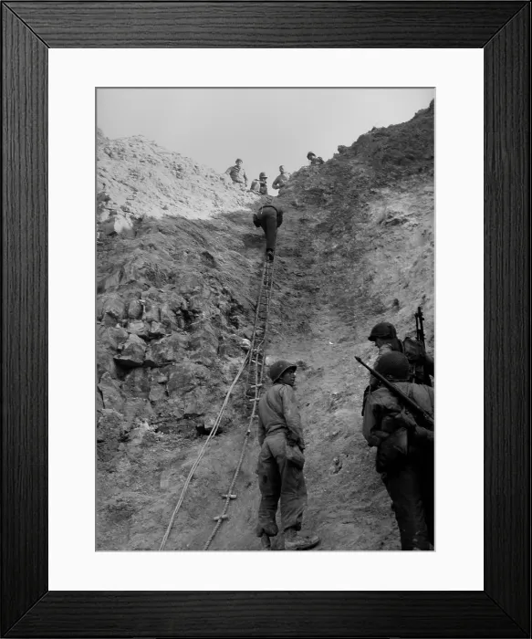 Framed Print : U.S. Rangers climb a cliff using a rope ladders at the Pointe du Hoc, Normandy