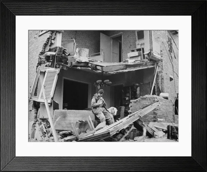 Framed Print : British Trooper rescued a puppy from the ruins German apartment in Geilenkirchen. Nov. 1944. Germany, World War 2. (BSLOC_2014_8_100)