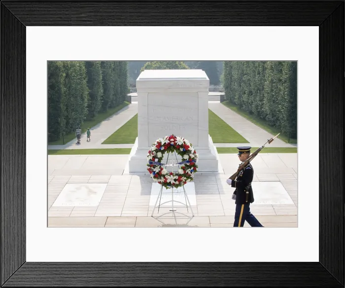 Framed Print : A soldier guards the Tomb of the Unknown Soldier at Arlington National Cemetery. Army's senior leadership laid a wreath in tribute to the Army's 233rd birthday