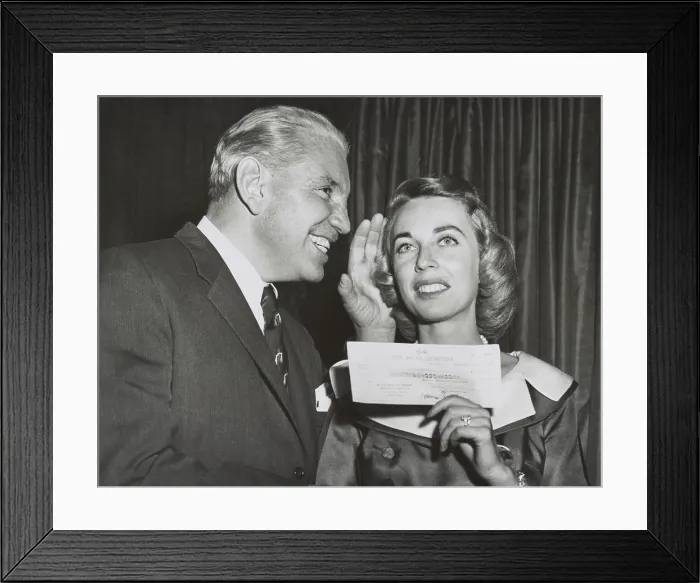 Framed Print : Dr. Joyce Brothers holds her check for correctly answering the $64, 000 Question