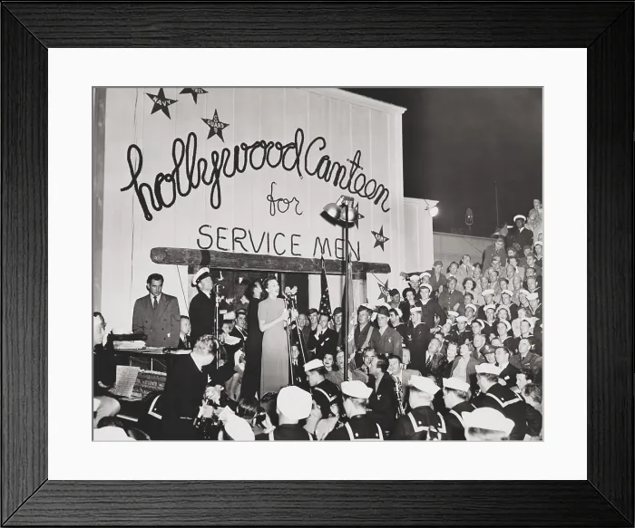 Framed Print : Singer Ginny Sims performs at the dedication of the Hollywood Canteen. The opening was attended by thousands of servicemen on Oct. 4, 1942. World War 2. (BSLOC_2014_8_211) Framed Print : Singer Ginny Sims performs at the dedication of the Hollywood Canteen. The opening was attended by thousands of servicemen on Oct. 4, 1942. World War 2. (BSLOC_2014_8_211)