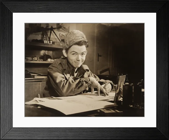 Framed Print : Soldier-Cartoonist Bill Mauldin seated at desk in office in Il Messagero building, Rome, Italy. Ca. 1945. (BSLOC_2014_8_212)
