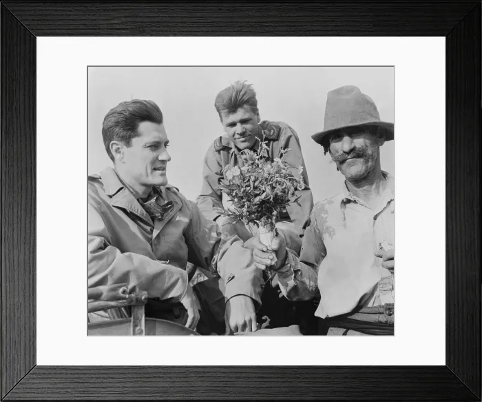 Framed Print : CBS News correspondent Eric Sevareid reporting from Italy during World War 2. He receives flowers from Italian peasant on June 20, 1944 Framed Print : CBS News correspondent Eric Sevareid reporting from Italy during World War 2. He receives flowers from Italian peasant on June 20, 1944