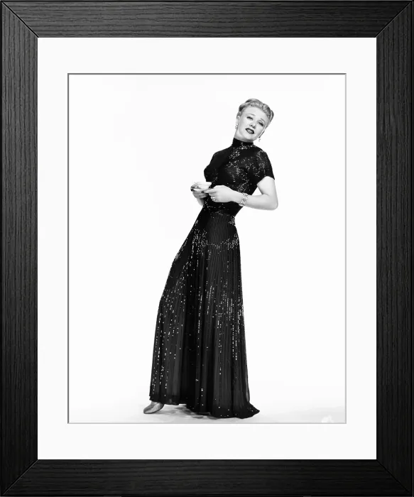 Framed Print : THE BARKLEYS OF BROADWAY, Ginger Rogers in dinner gown designed by Irene, 1949