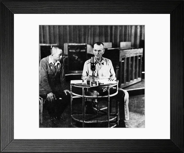 Framed Print : U.S. General Jonathan Wainwright ordering the surrender of American forces in the Philippines. He is supervised by a Japanese Army censor. May 1942. World War 2 Framed Print : U.S. General Jonathan Wainwright ordering the surrender of American forces in the Philippines. He is supervised by a Japanese Army censor. May 1942. World War 2