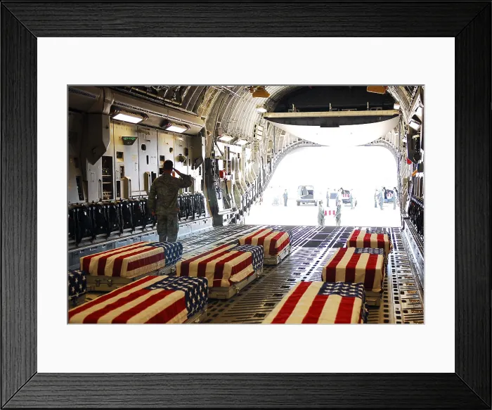 Framed Print : Flag draped coffins of five US soldiers killed at Fort Hood. 13 were killed and 38 injured on Nov