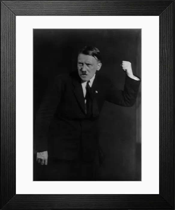 Framed Print : Adolf Hitler in dramatic oratorical pose. He rehearsed his hand gestures in photos taken by Heinrich Hoffman, ca. 1930. (BSLOC_2013_9_168) Framed Print : Adolf Hitler in dramatic oratorical pose. He rehearsed his hand gestures in photos taken by Heinrich Hoffman, ca. 1930. (BSLOC_2013_9_168)