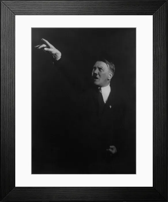 Framed Print : Adolf Hitler in dramatic oratorical pose. He rehearsed his hand gestures in photos taken by Heinrich Hoffman, ca. 1930. (BSLOC_2013_9_170) Framed Print : Adolf Hitler in dramatic oratorical pose. He rehearsed his hand gestures in photos taken by Heinrich Hoffman, ca. 1930. (BSLOC_2013_9_170)