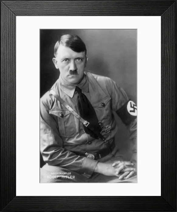 Framed Print : Adolf Hitler, in a military uniform, when he was Chancellor of Germany. Ca. 1933-1938. Photo by Heinrich Hoffmann. (BSLOC_2013_9_172)