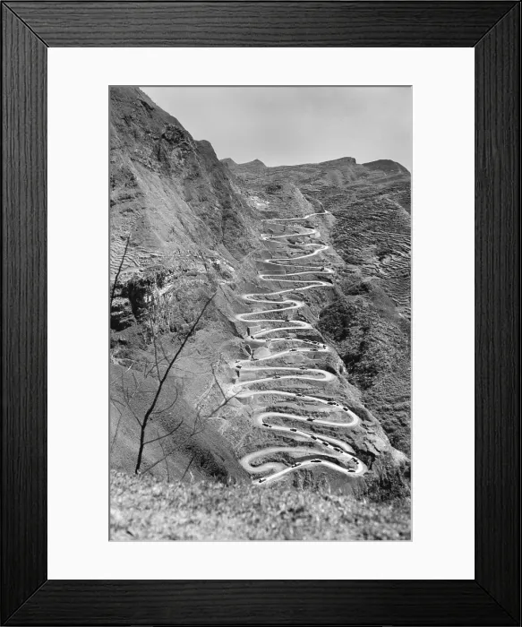 Framed Print : U.S. Convoy which operates between Chen-Yi and Kweiyang, China. It is ascending the famous twenty-one curves at Annan, China